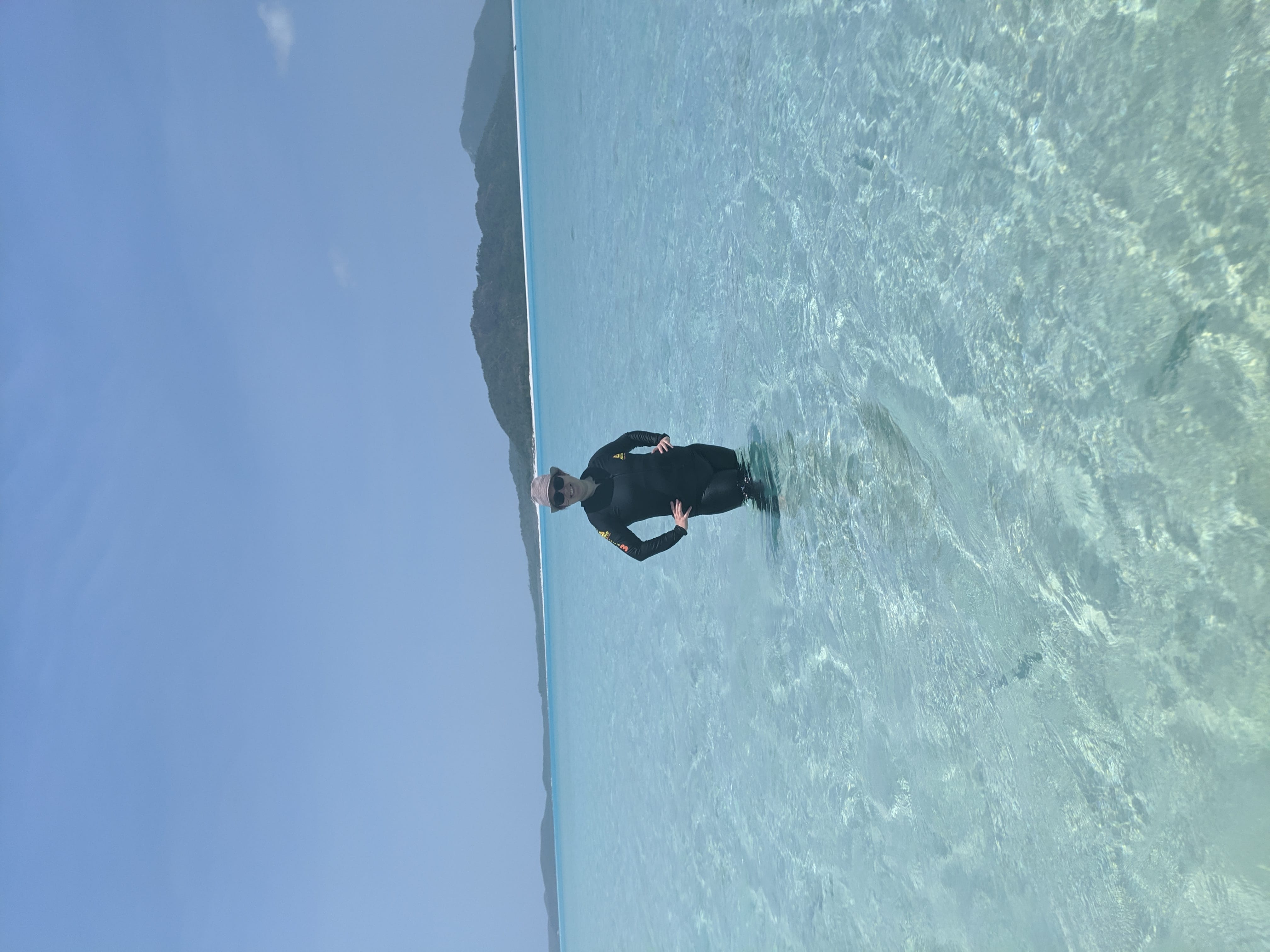 Modelling my stinger suit in a lagoon in the Whitsunday Islands